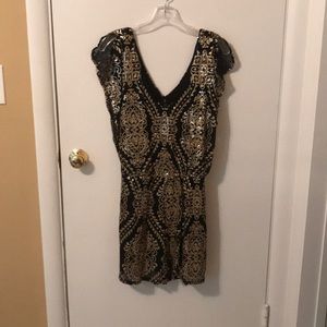 Black and gold sequin romper